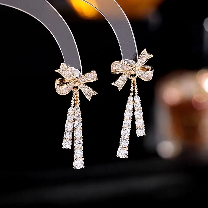 

Design French bow earrings with zircon earrings for minority.
