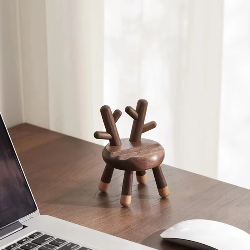 

Wooden desktop creative deer stool mobile phone stand personality cute office desktop lazy solid wood mobile phone stand