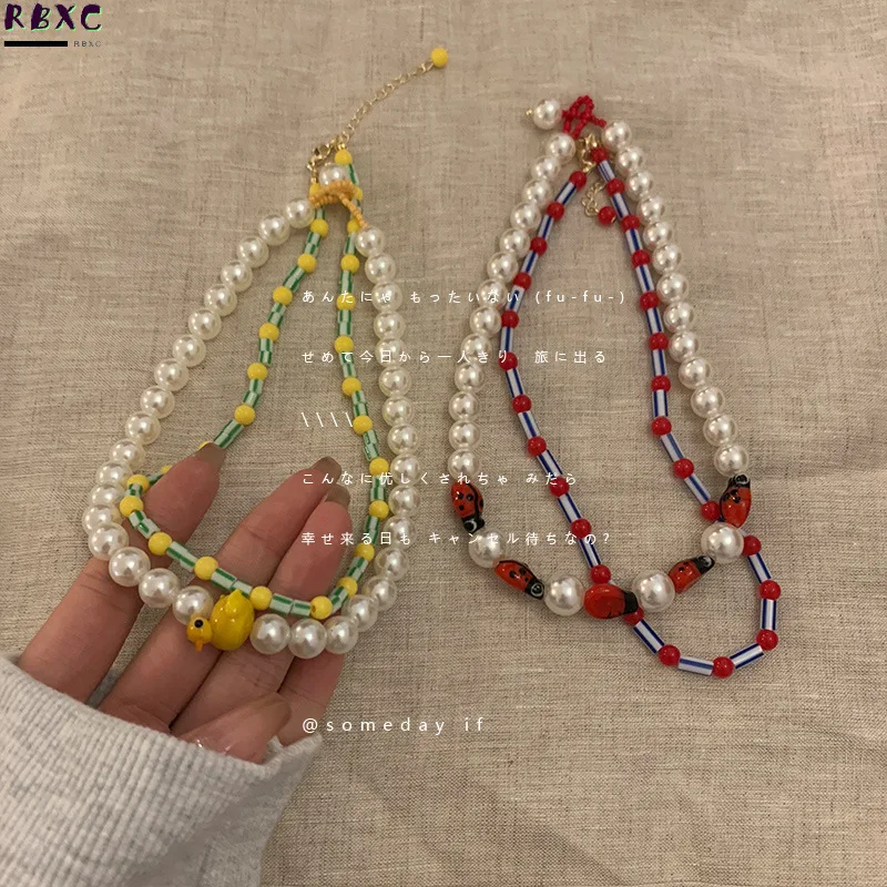 

the Same Little Yellow Pearl Necklace Dynasty Women's Summer Collarbone Design Sense of Niche Color Neck Chain 2022 New