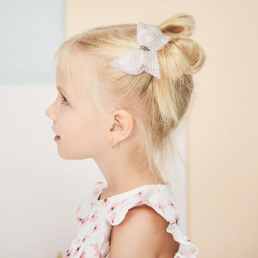 Рисунок 3 - Аксессуары для волос с белым жемчугом