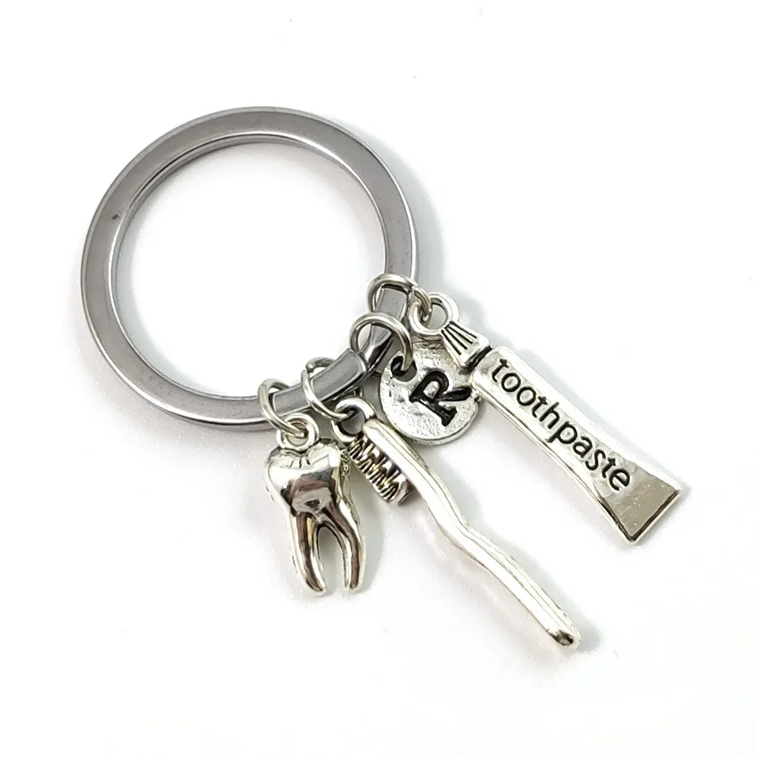 

Creative Metal Toothpaste Toothbrush Tooth Key Chain Personality Car Bag Key Pendant