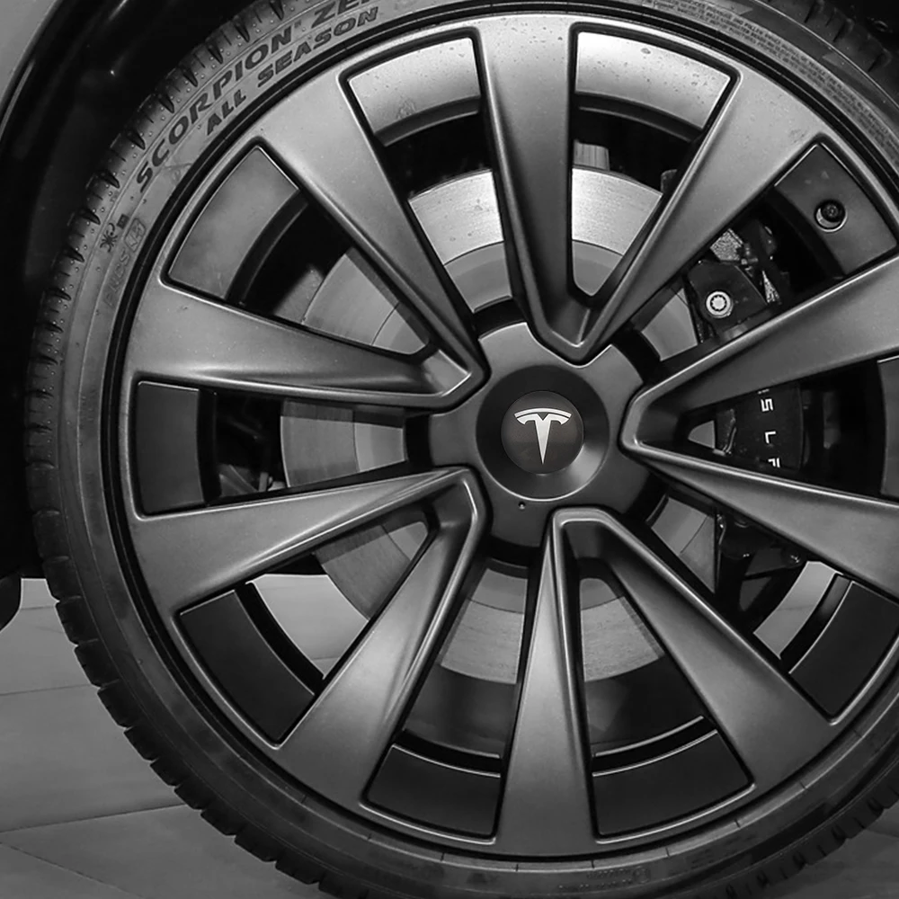 Фото Наклейки-эмблемы на центральные колпачки колес Tesla 3D для Tesla Model 3, Model S, Model X, Coil Mod, WYE, K80 №3