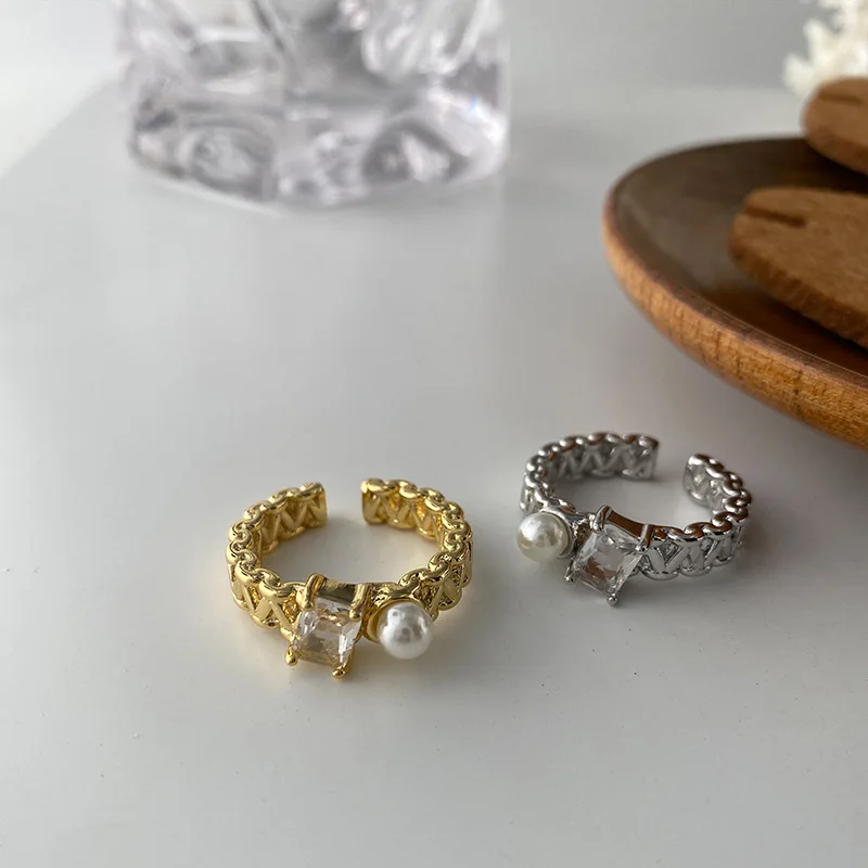 

2022 South Korea's New Metal Woven Pearl Open Ring Fashion Simple Temperament Versatile Ring Female Jewelry