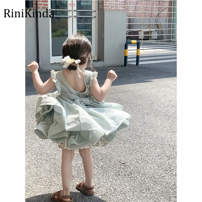 

Детское платье с большим бантом и оборками, без рукавов