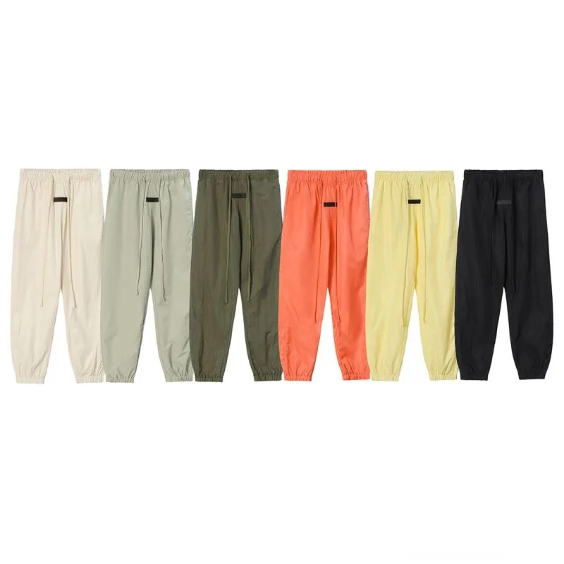 

Essentials Eighth Season Zipper Quick-dry Nylon Casual Trousers Men Women Pants Pantalones De Mujer Conjuntos De Calça Spodnie