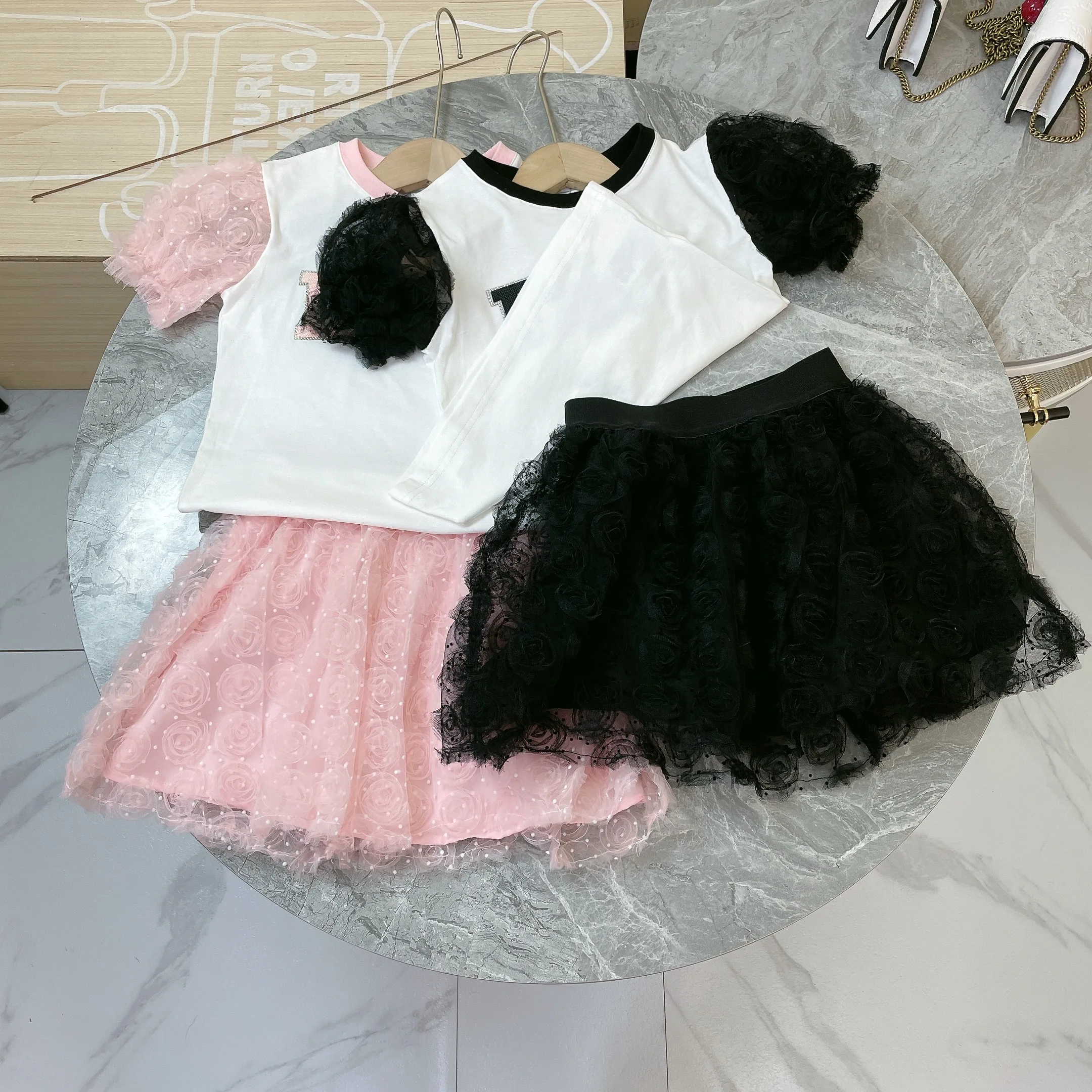 

Girls' boutique clothing 2022 summer style cotton top short sleeve + flower mesh design short skirt two pieces