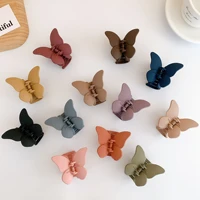 2022 wholesale hot selling cute medium matte pure color butterfly decorative accessories plastic hair claw clips for women girls