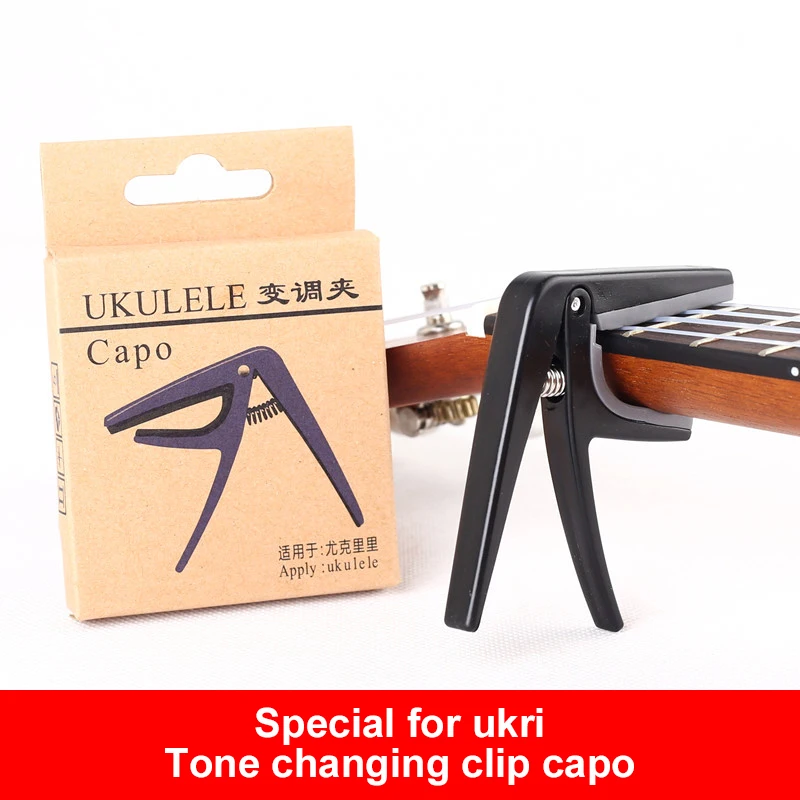 

Professional Ukulele Capo 4 Strings Hawaii Guitar Capo Single-handed Quick Change Ukelele Capo Guitar Tuner Guitar Accessories