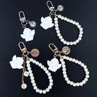 angel sculpture key chain for girls lovely hand made pearl chain airpods pendant car keyring women bag accessories charm gift