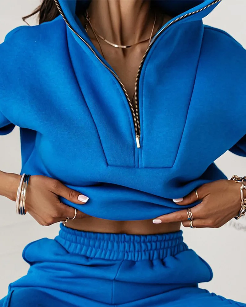 

Женский спортивный костюм из двух предметов с длинным рукавом и круглым вырезом