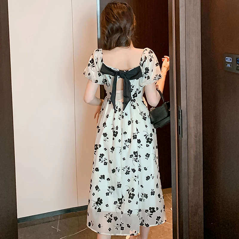 

Женское шифоновое платье с бантом на спине и коротким рукавом