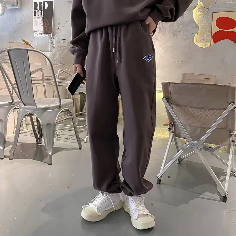 

Новинка весна-лето 2023 модные повседневные свободные мужские и женские штаны для пар с вышивкой