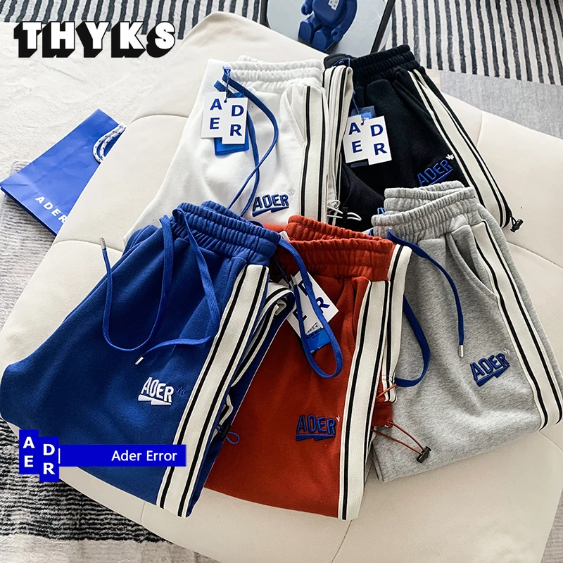 Мужские спортивные брюки с вышивкой и логотипом в полоску |