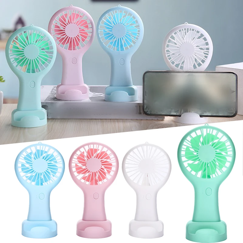 

Mini Portable Pocket Fan HandHeld Travel Cooling Fans USB Rechargeable Outdoor Home Air Cooler with Phone Holder in Office