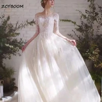 gorgeous white a line organza appliques o neck wedding dresses delicate lace embroidery bridal wedding robe sweetheart backless