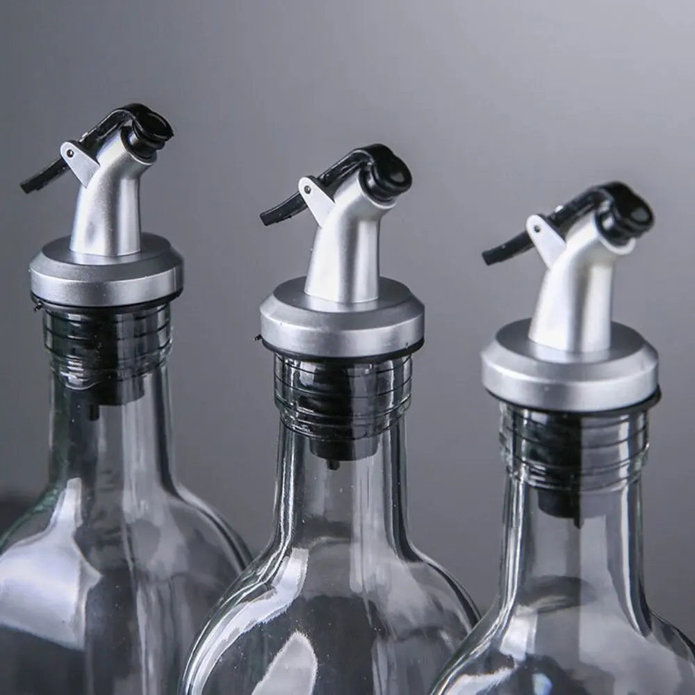 

Oil Spouts Oil Bottle Stopper Olive Oil Pour Spouts Wine Pourers Lock Plug Leak-proof Food Grade Rubber Nozzle Liquor Dispenser