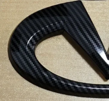 

ABS черный карбоновый логотип, эмблема, передняя эмблема, значок, значок на задний багажник, наклейка для Infiniti Q50 Q50L, аксессуары в виде ракушки