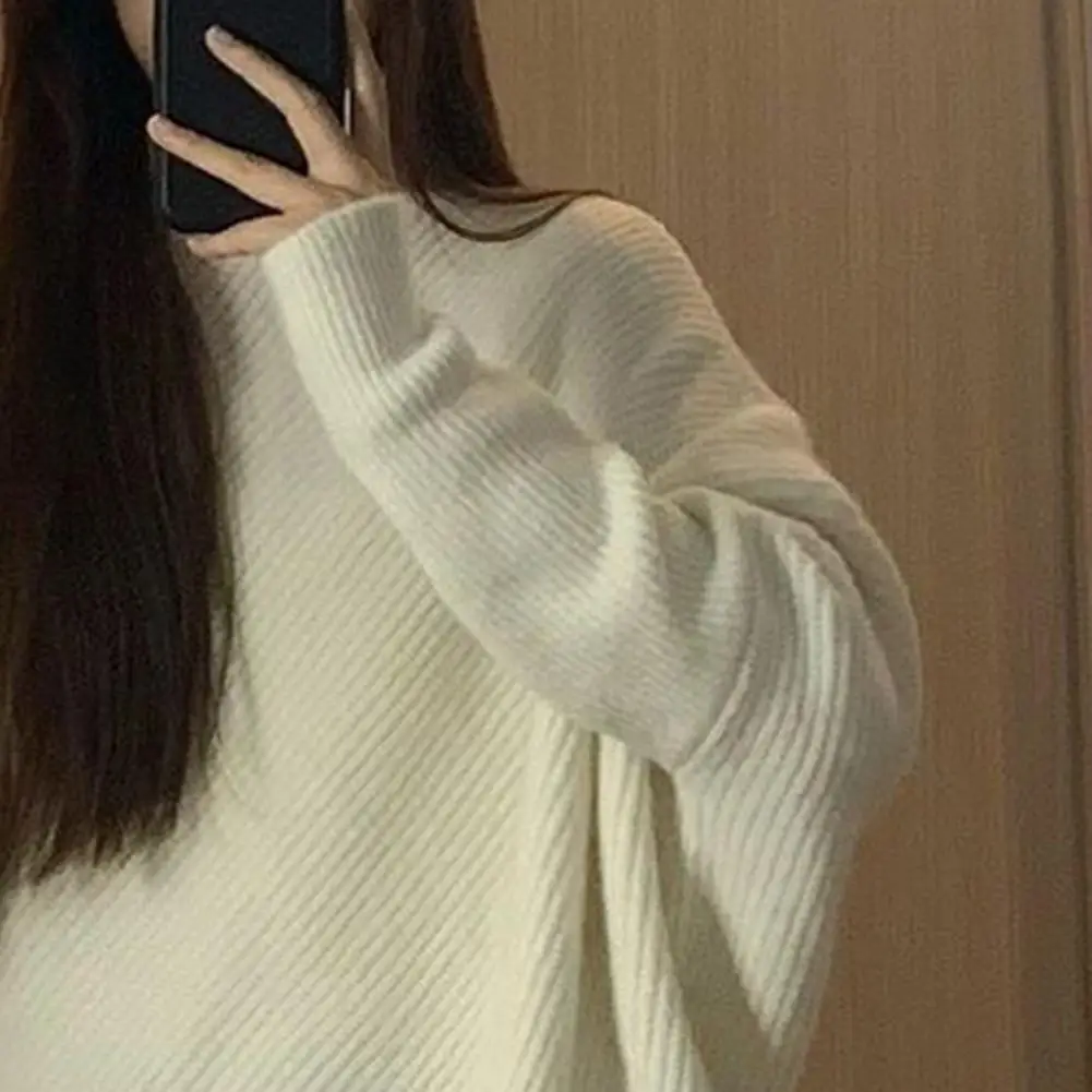 Осенне-зимний женский свитер с высоким воротником и асимметричным подолом