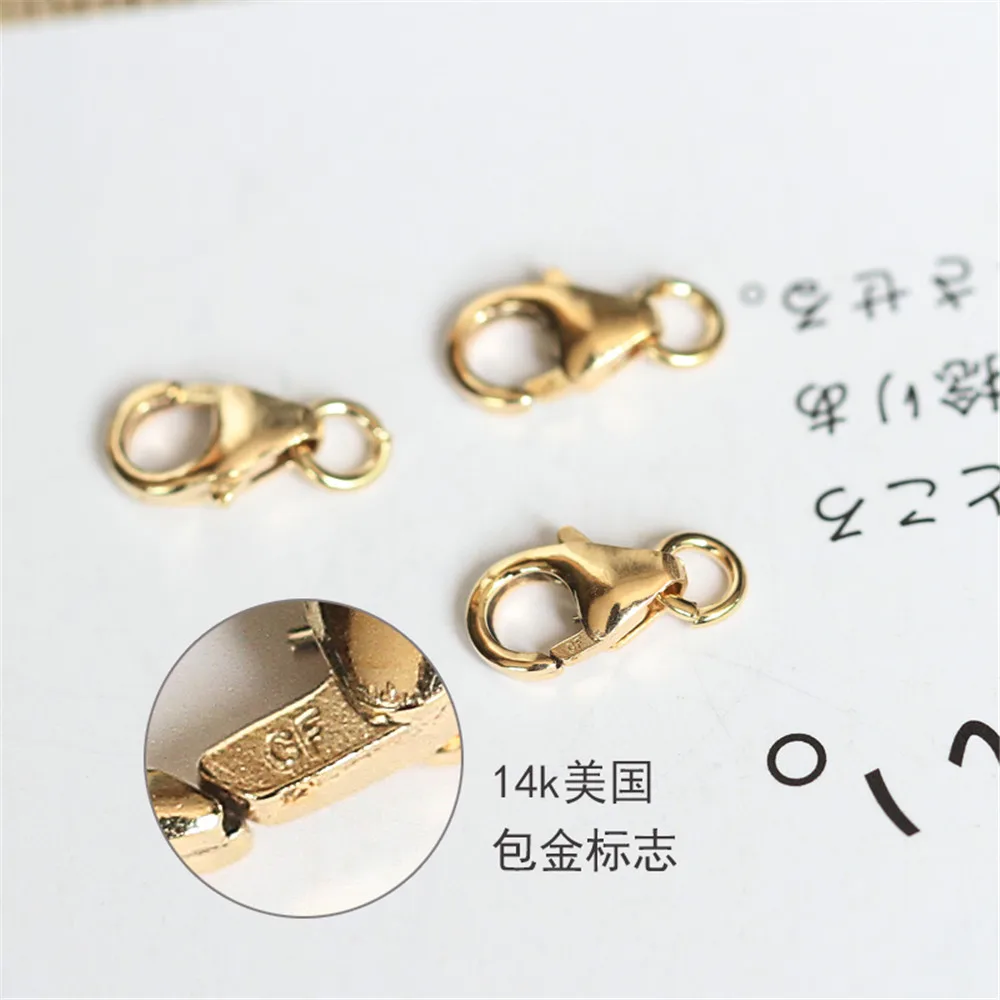 

The United States imports 14K Gold Filled lobster buckle day word buckle square buckle belt LOGO import DIY accessories