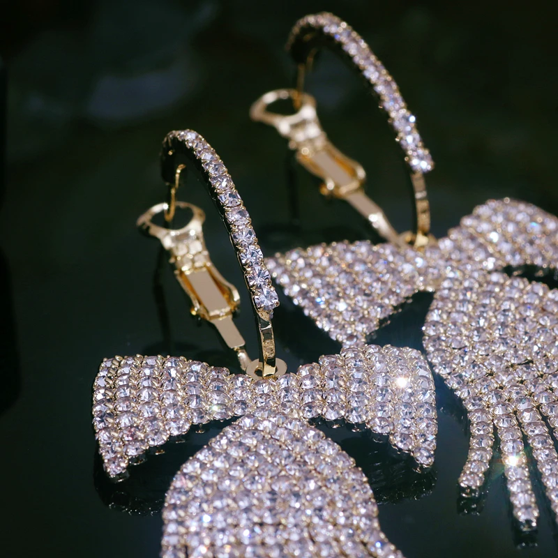 Женские серьги-подвески с бантом