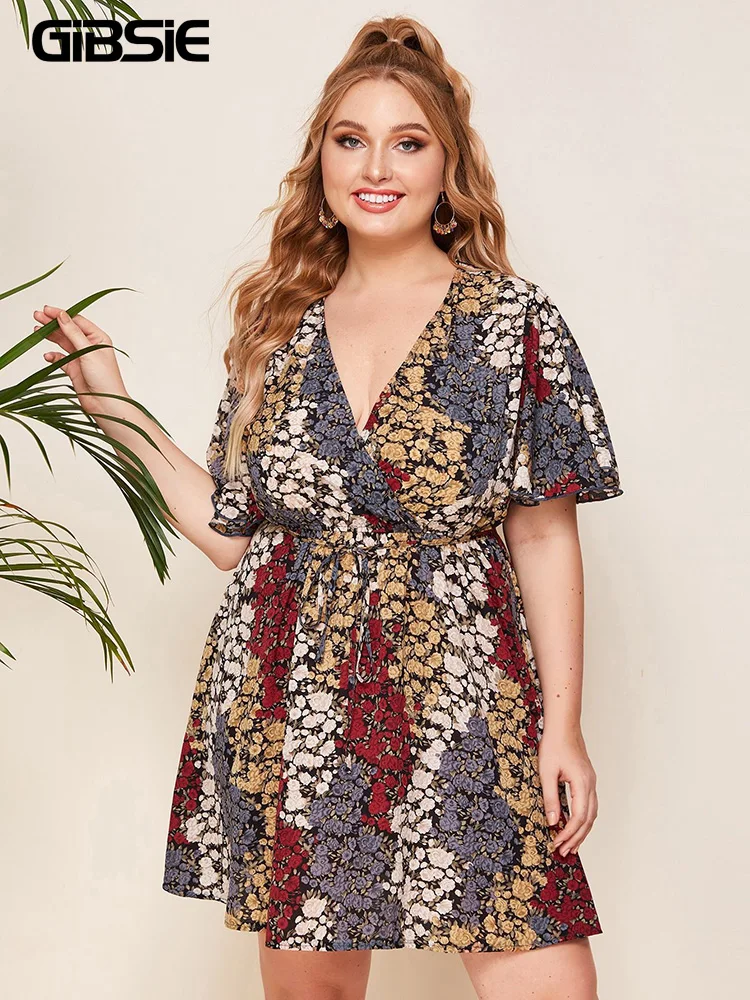 

GIBSIE Plus Size Surplice Neck Floral Print Belted Dress Holiday Boho Women Summer Short Sleeve High Waist A-Line Dresses 2022