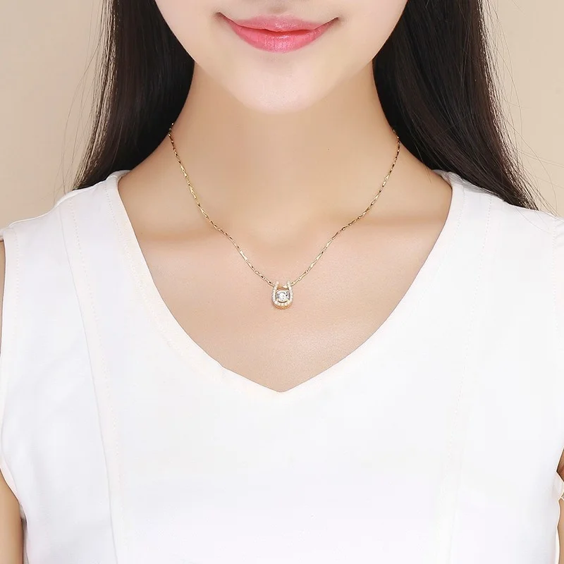 Подвеска в форме подковы из серебра 925 пробы с фианитом золотого цвета | Украшения