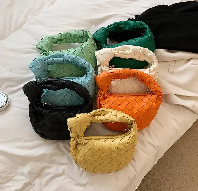 

designer handbag Mini Jodie Top Handle Bag Intrecciato-woven top handle bag Knotted detailing at fixed carry handle Zip closure