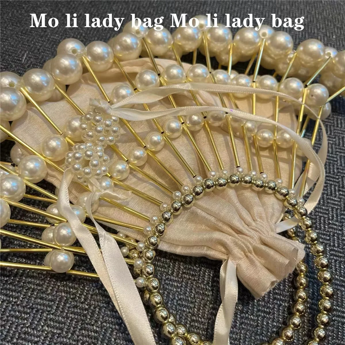 Роскошная женская сумка с жемчужными бусинами