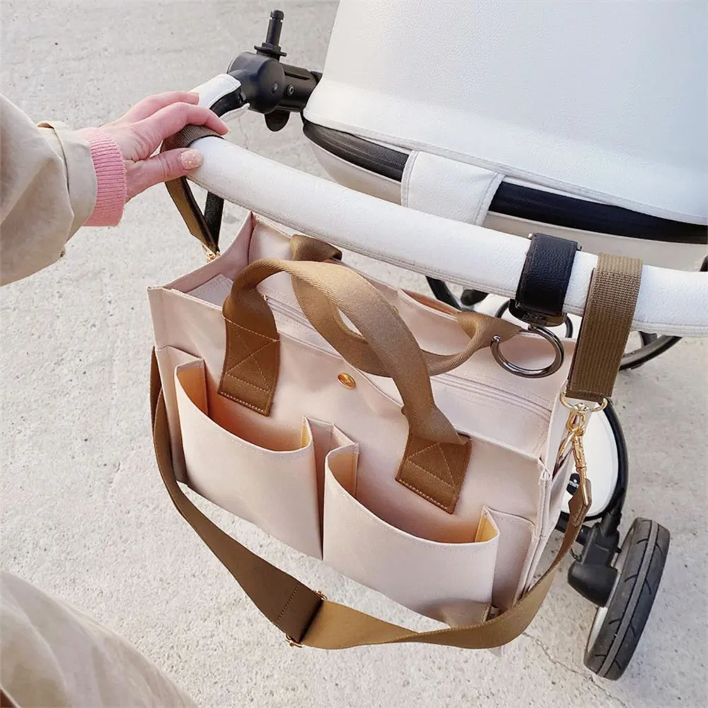 

Newborn Baby Care Diaper Bag Travel Mummy Bag Stroller Diaper Bottle Comfort Toy Storage Organizer Mother Care Handbags