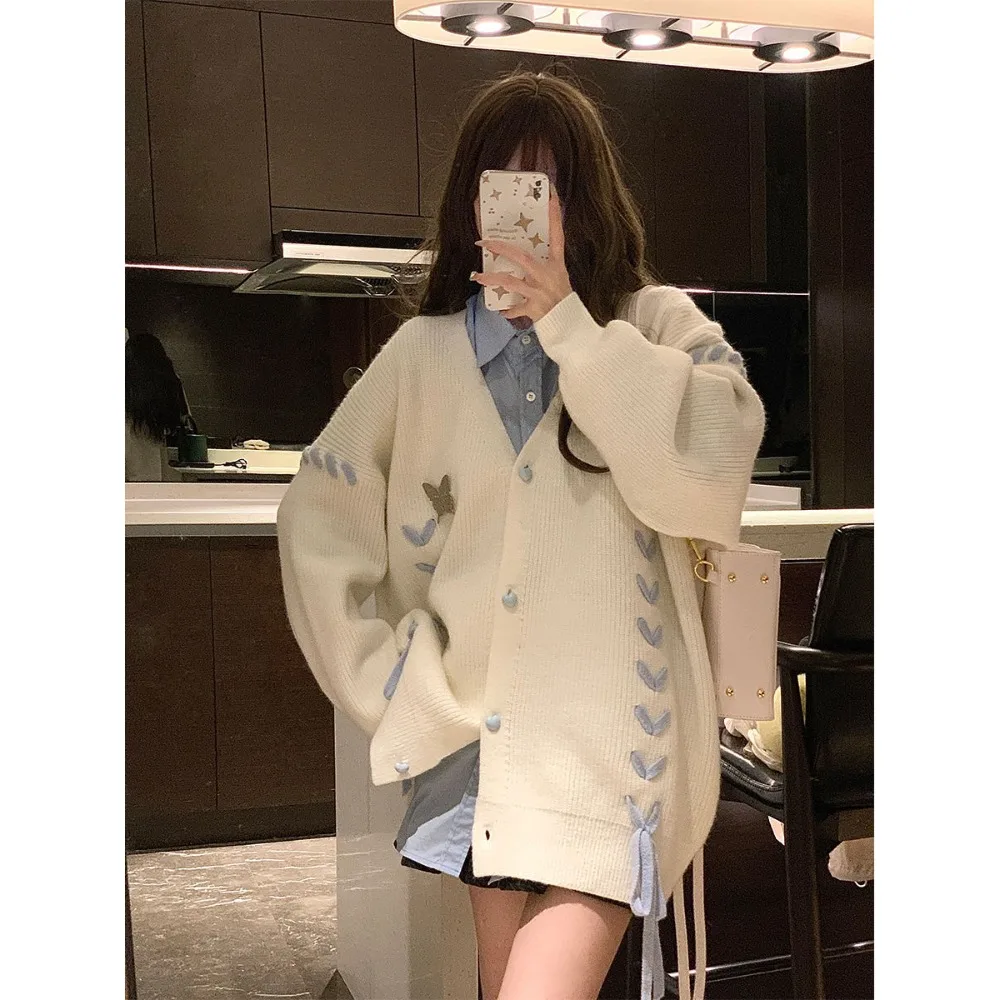 

Soft waxy sweater women spring and autumn loose lazy wind design casual Joker cardigan coat tide.