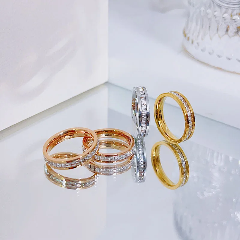 

CARLIDANA Luxury Stainless Steel Rose Gold Color Love Ring for Women Couple CZ Crystal Ring Luxury Brand Jewelry Wedding Gifts