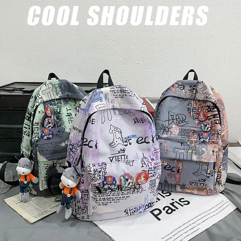 

New student schoolbag Korean version large-capacity junior high school student graffiti tide cool tooling wind campus backpack