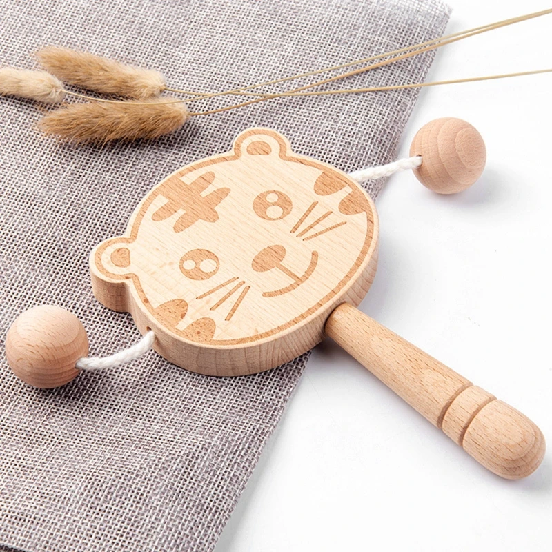 

Hand Bell Teething Pain Relief Rattle Drum Toddler Shaking Soothing Toy Babies Nursing Toys Musical Rattle Infant Gift