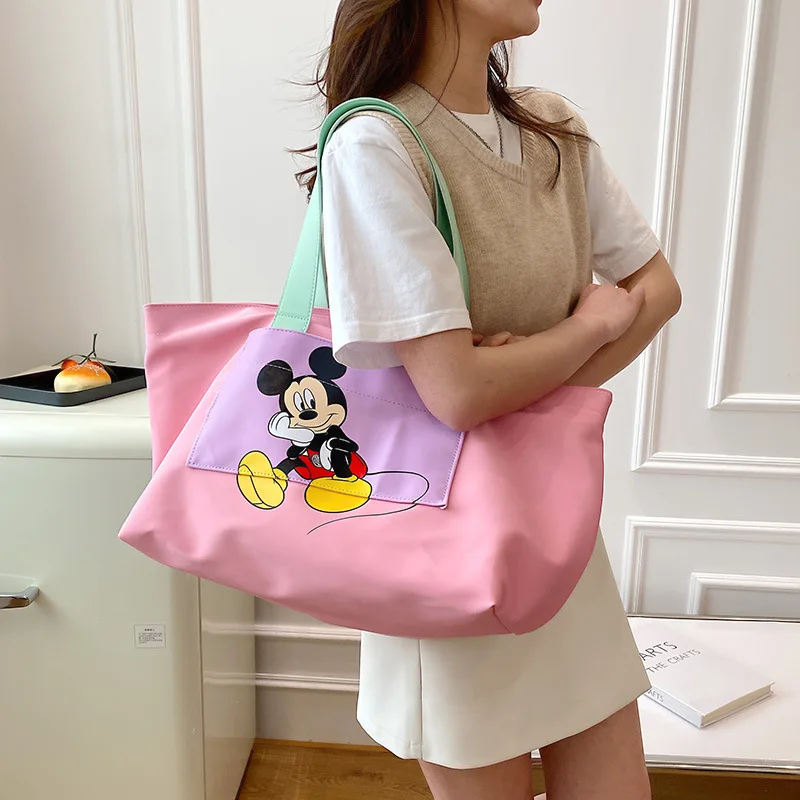 

Новинка 2022, женская сумка Disney с Микки Маусом, милая мультяшная модная женская сумка через плечо, вместительная Роскошная брендовая Студенче...