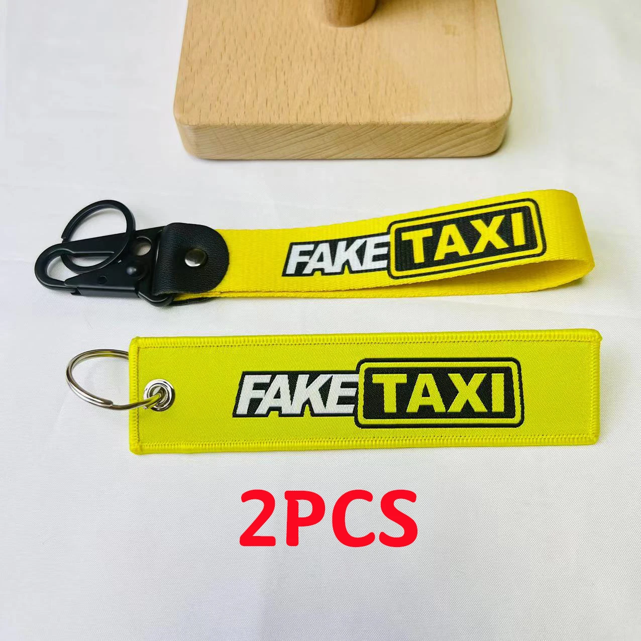 

2 шт. автомобильный брелок желтый нейлоновый тканевый брелок с эмблемой ремешок для поддельного такси Honda Mazda KIA Ford Toyota BMW VW Suzuki аксессуары