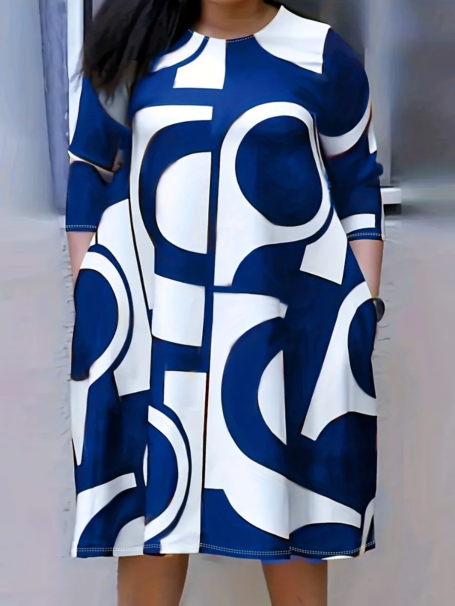 Женское платье-трапеция с круглым вырезом длинным рукавом и карманами