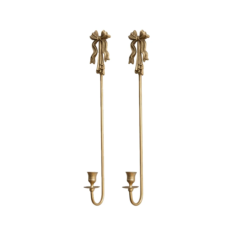 

Золотой металлический настенный подсвечник