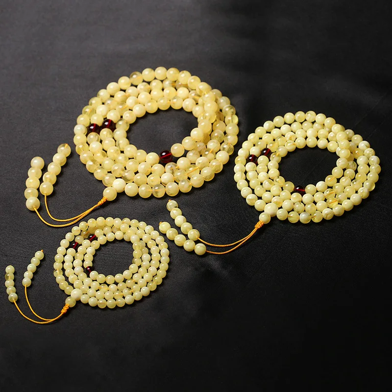 

Russian Old Beeswax White Flower Beeswax Hand String 108 Chicken Oil Yellow Round Beads Hand String Men's Women's Rosary Beads