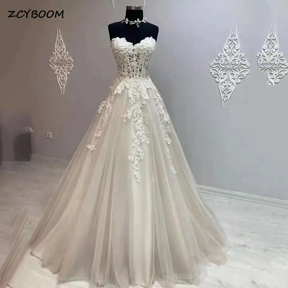 

Elegant Tulle Appliques Party Prom Gowns 2023 A-Line Strapless Shiny Beaded Backless Evening Dresses For Women Robes De Soirée