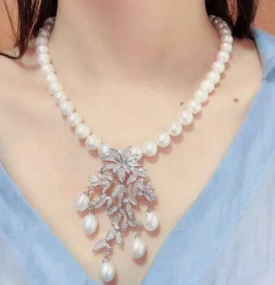 

Hand knotted natural 8-9mm white freshwater pearl leaves micro inlay zircon accessoriese clasp sweater necklace long 45 cm