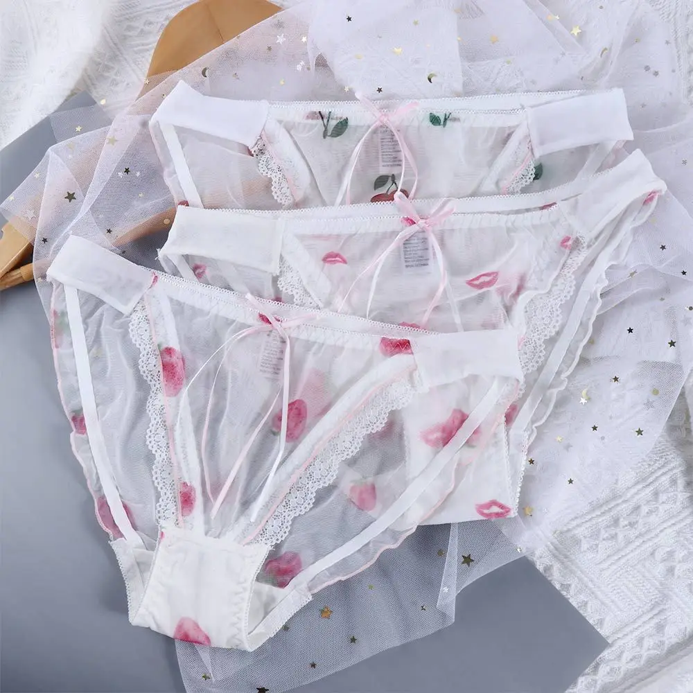 

Трусики-Тонги женские кружевные с заниженной талией и бантом