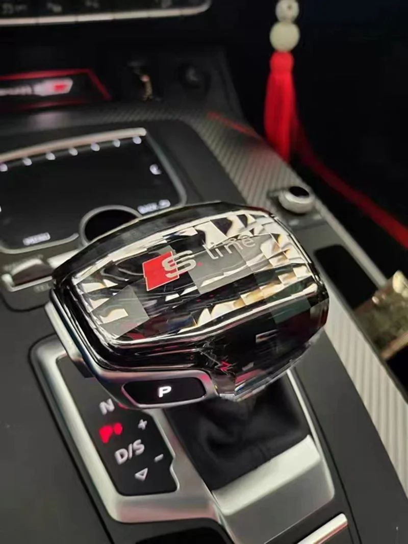 

Подходит для Audi crystal gear. Шестерня из углеродного волокна A4L A6L A5 A7 A8 Q5L Q7 Q8 заменена на заднюю крышку.