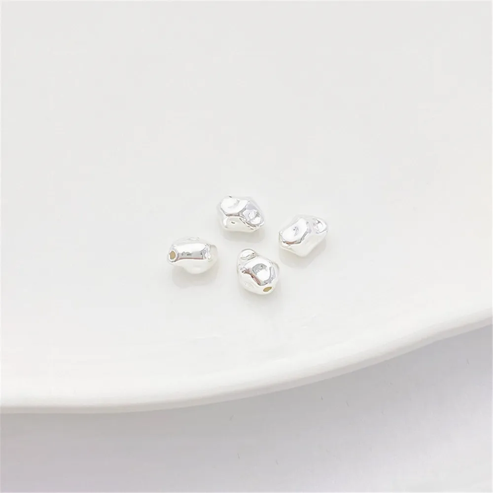 Толстые посеребренные бусины неправильной формы рассыпчатые ручной работы