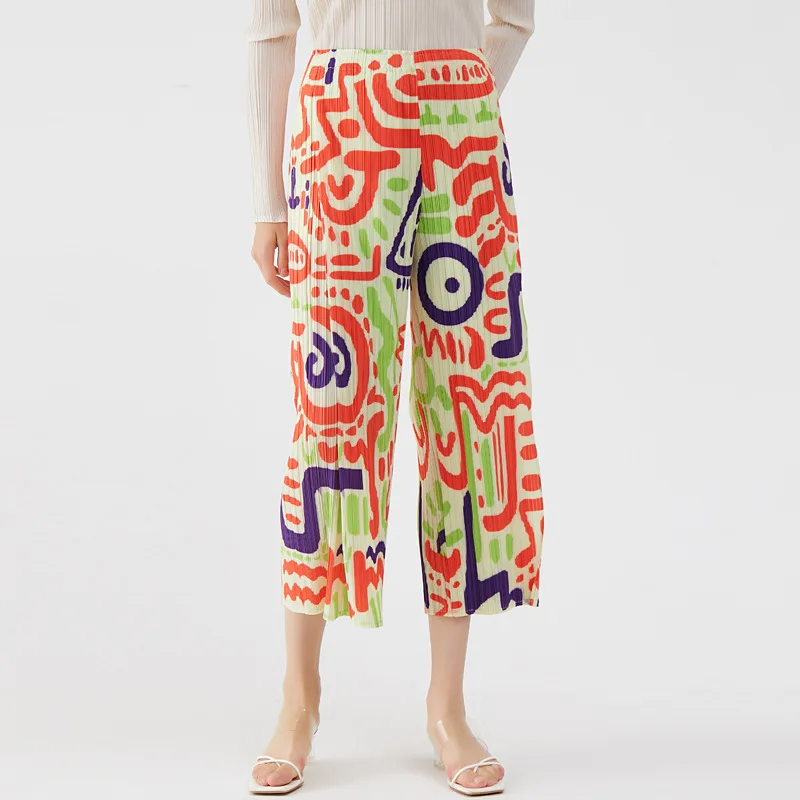 Miyake fold personality trend design sense printing casual nine-point pants women's 2022 new loose and comfortable trousers