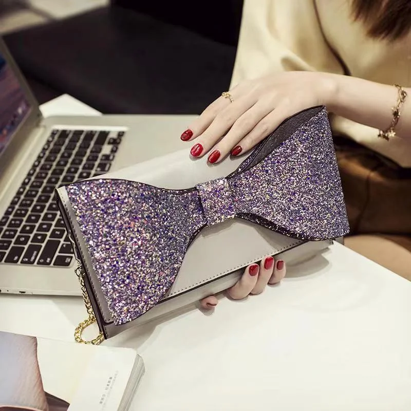 

Женская сумка-клатч с блестками