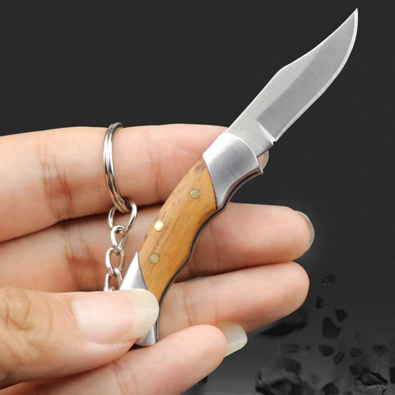 

Stainless Steel Personality Knife Key Chain Portable Mini Multi-function Outdoor Sharp Edc Folding Tool
