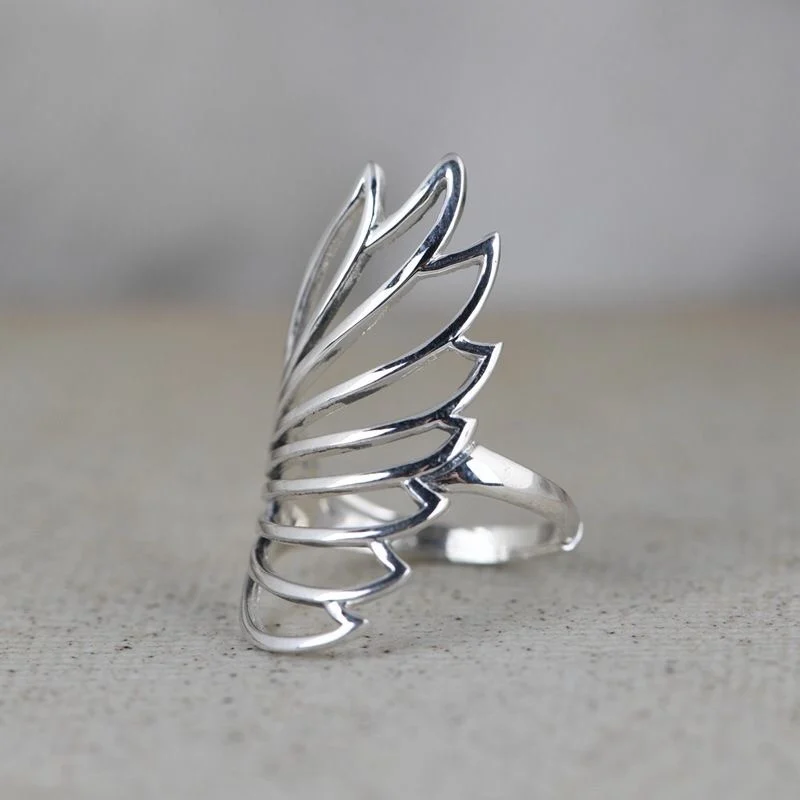

Simple art hollow wings fashion ring 925 silver