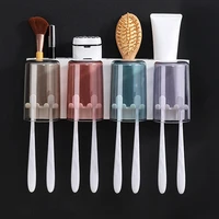 toothbrush holder and toothpaste dispenser wall mounted punch free waterproof bathroom accessories washing table shelf for cup