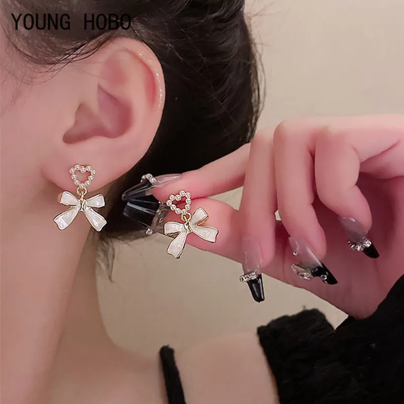 

YOUNG HOBO New Simple Enamel White Bow Ear Clip on Earrings Female Fashion Sweet Pearl Heart Clip Earrings Piercing for Women