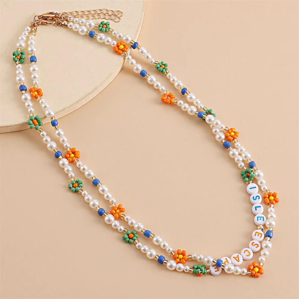 

Creative rice beads woven colorful daisy flower letter necklace female pearl light luxury Necklace women's gift